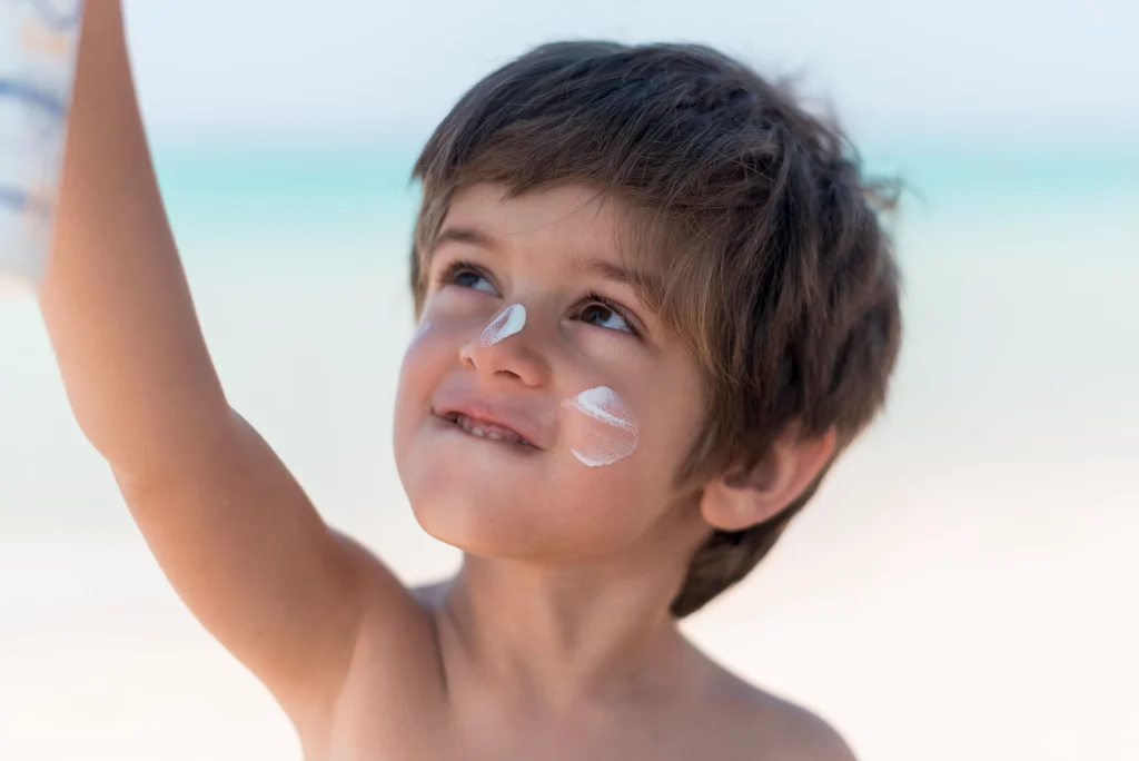 cute-boy-beach-looking-up